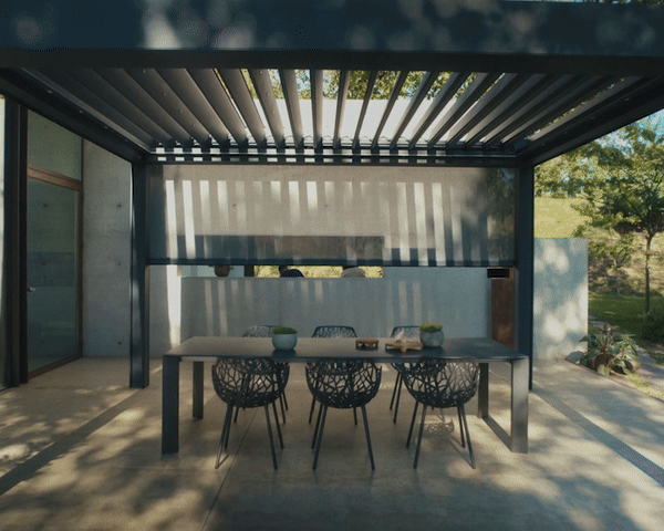 Modern outdoor dining area with aluminum louvered pergola and stylish furniture