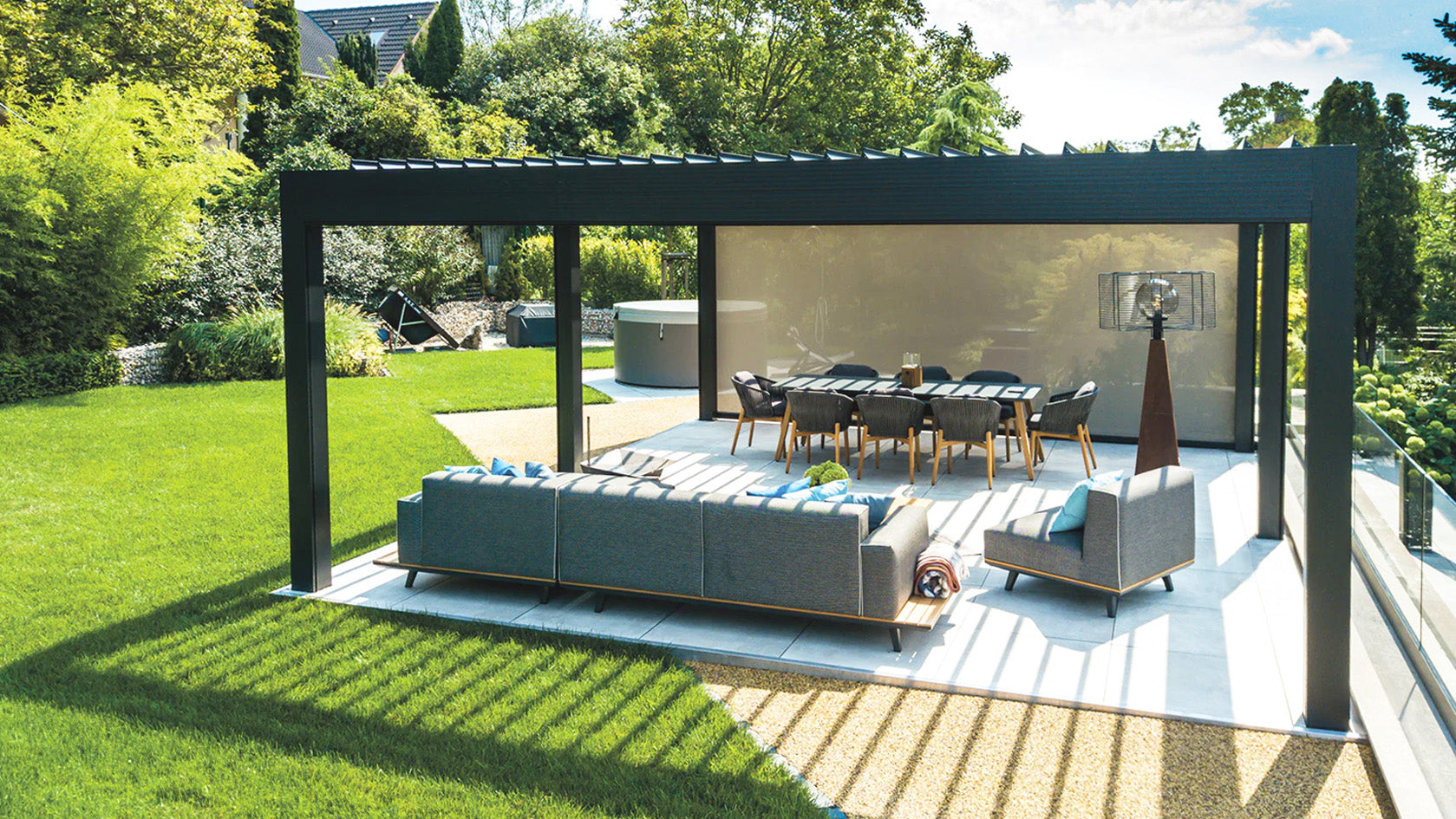 Modern luxury pergola with louvered roof, garden seating, and dining area in landscaped yard