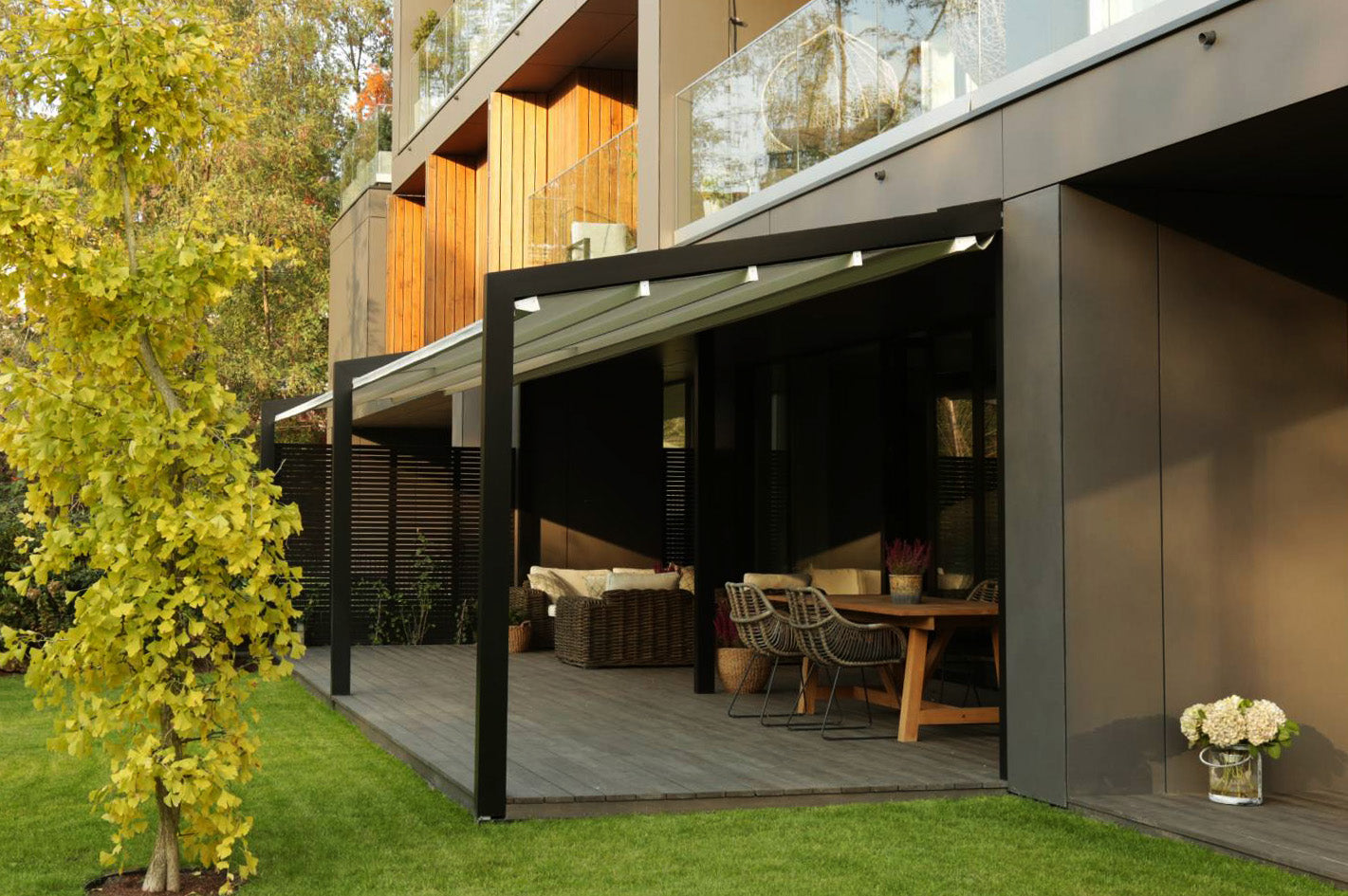 Modern home patio with luxury pergola, outdoor dining set, and stylish aluminum structure